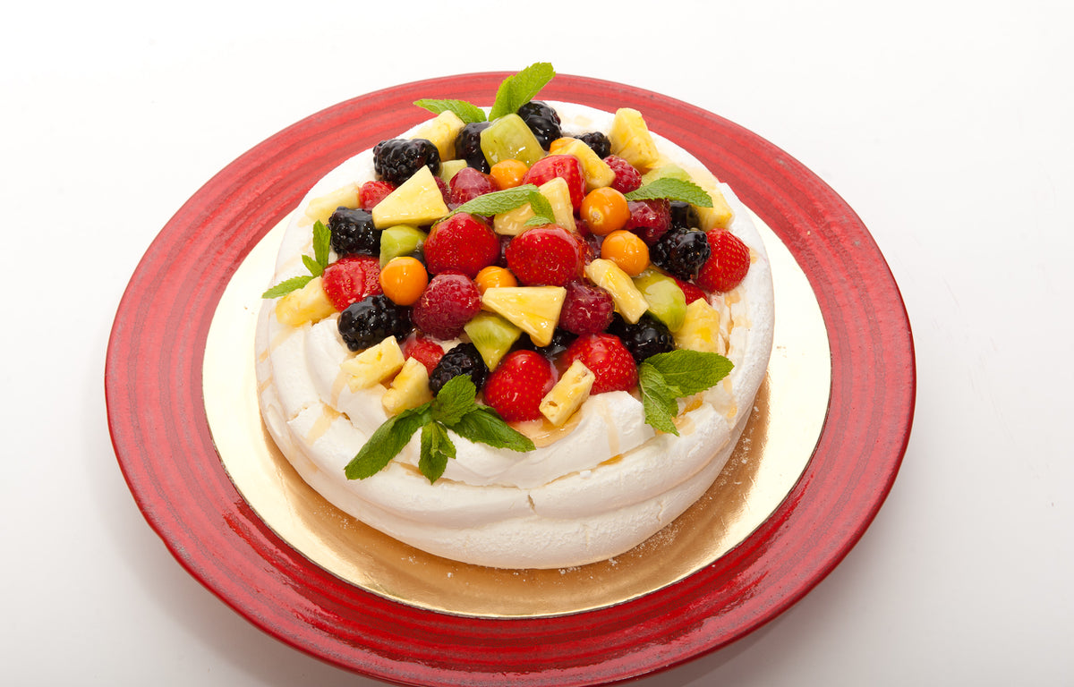 Pavlova with fresh fruit & cream