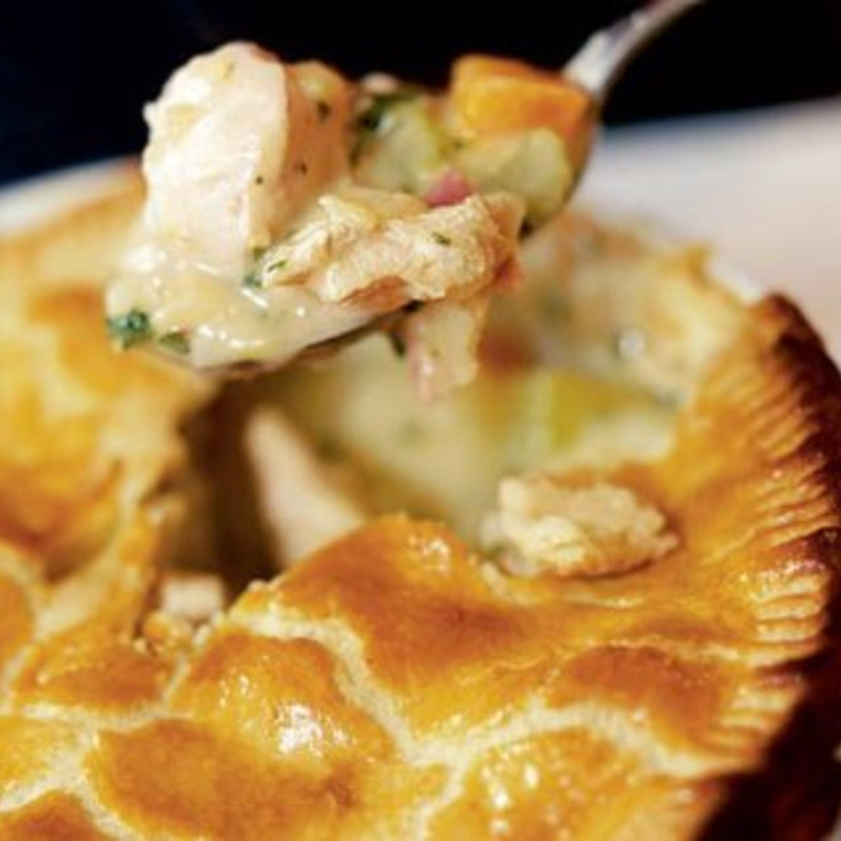 Glazed ham, chicken, leek and tarragon pie